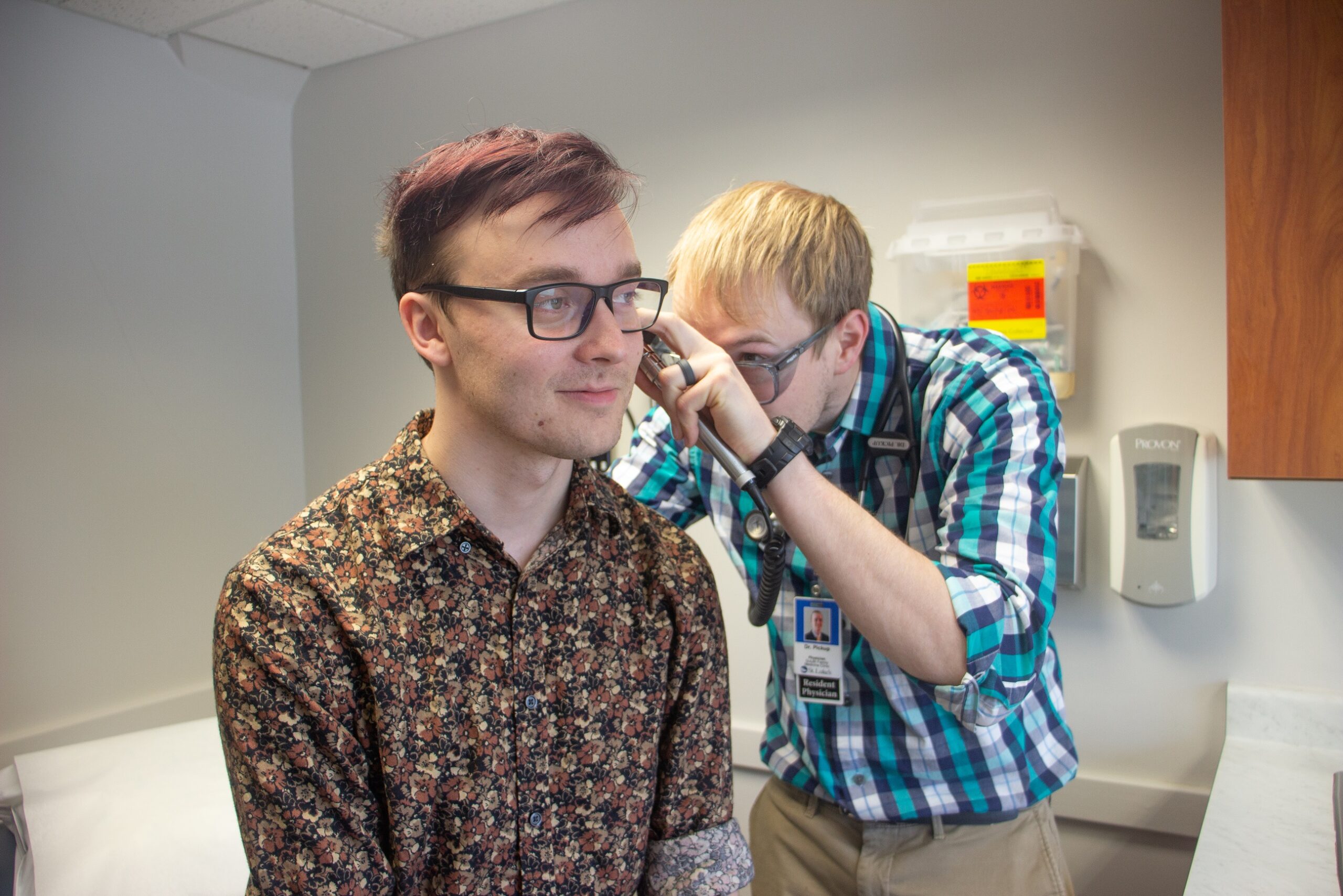 Doctor doing an exam with a patient